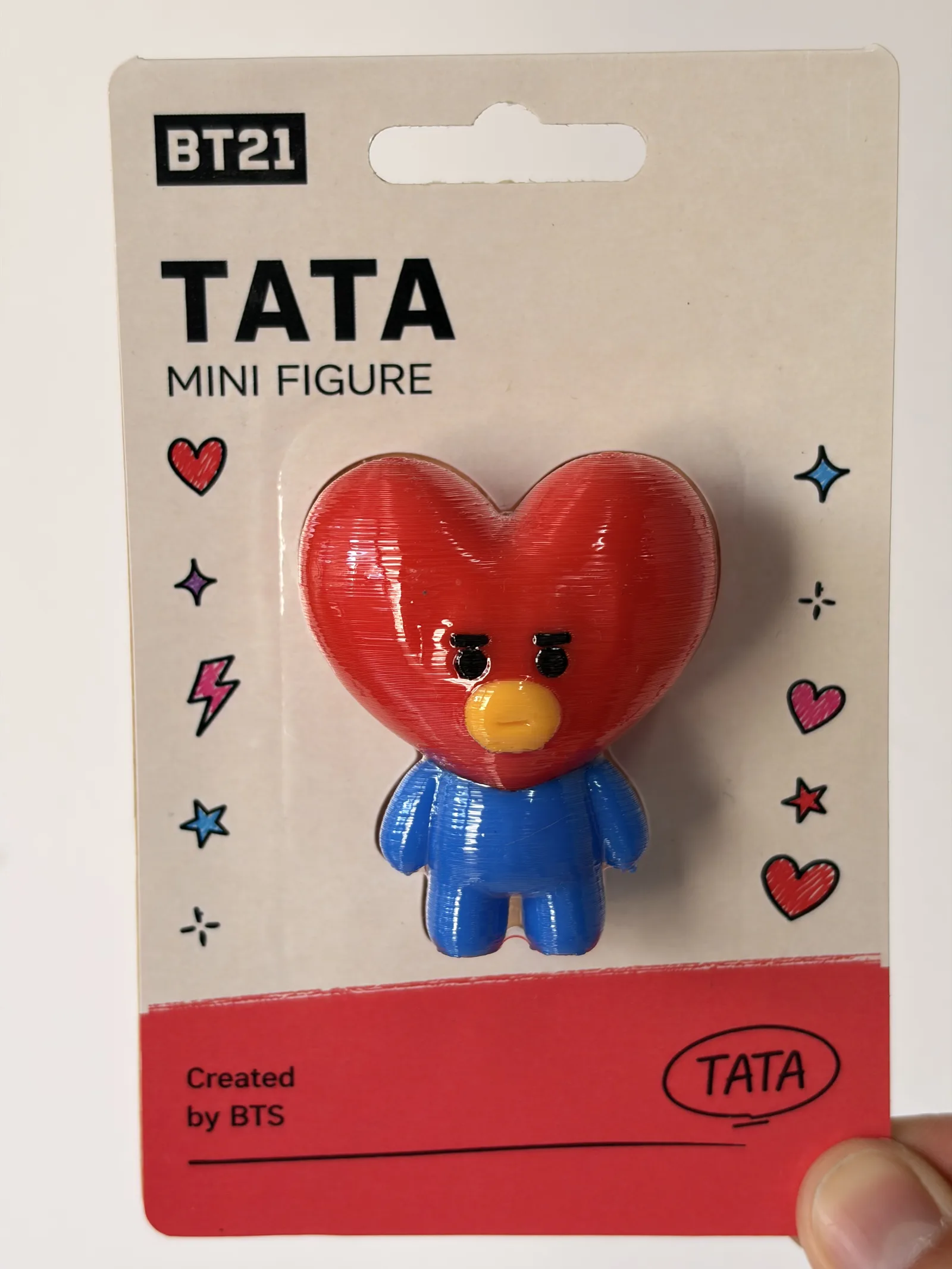 Blíster de la mini figura de Tata, frente